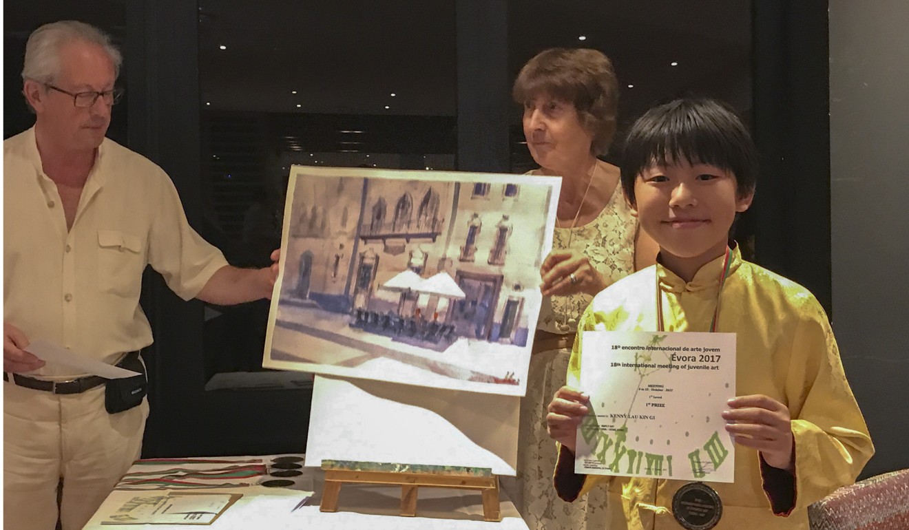Kenny Lau (right) in Portugal, where he won first prize at the 18th International Meeting of Juvenile Art. Photo: Handout