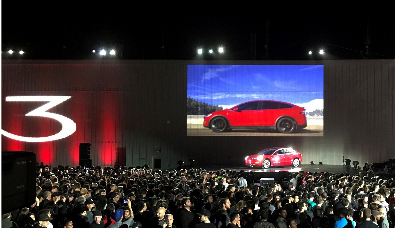 Tesla introduces one of the first Model 3 cars off the production line during an event at the company's facilities in Fremont, California on July 28. Photo: Reuters