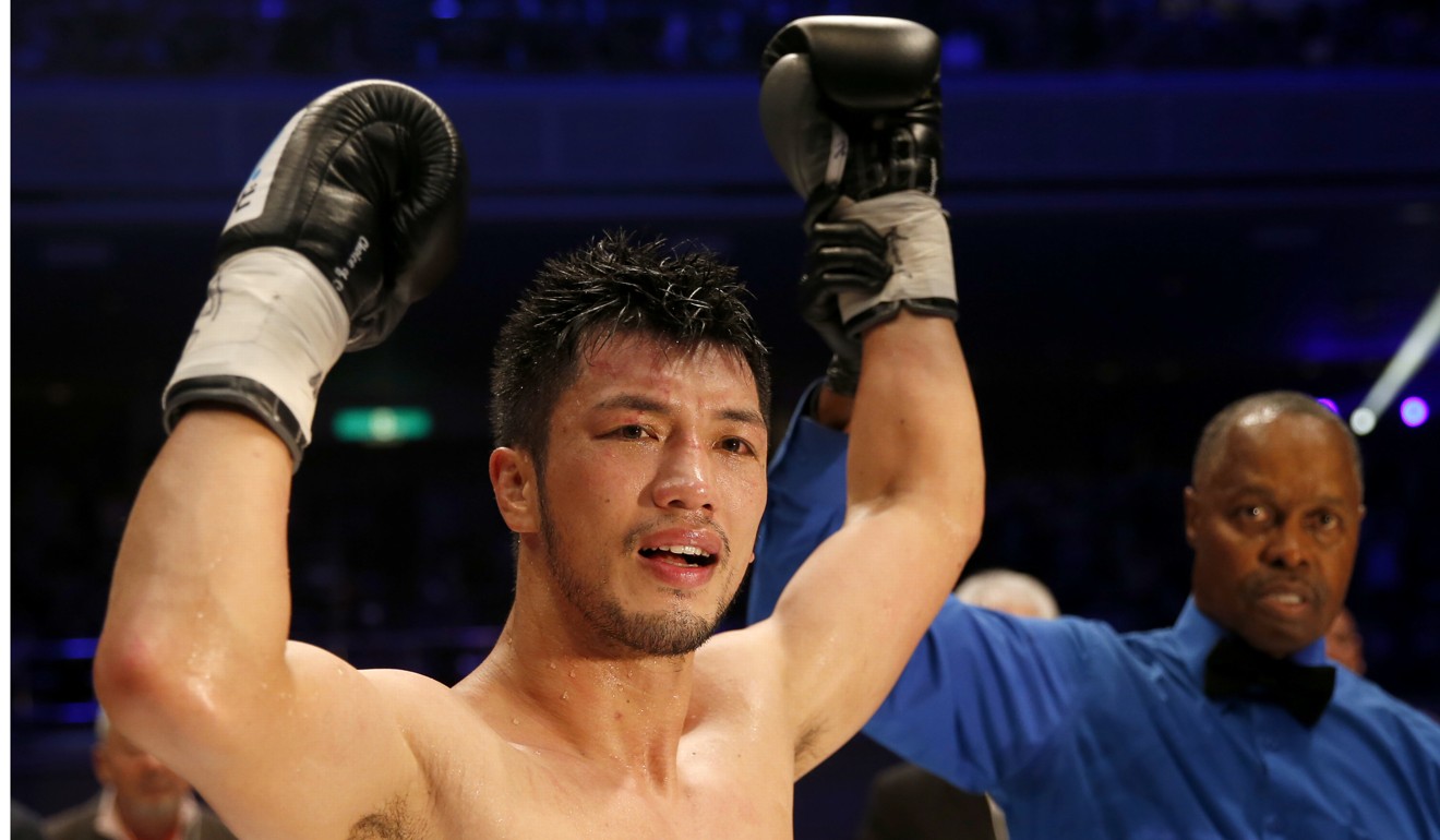 Ryota Murata cries as he is declared the winner. Photo: AP