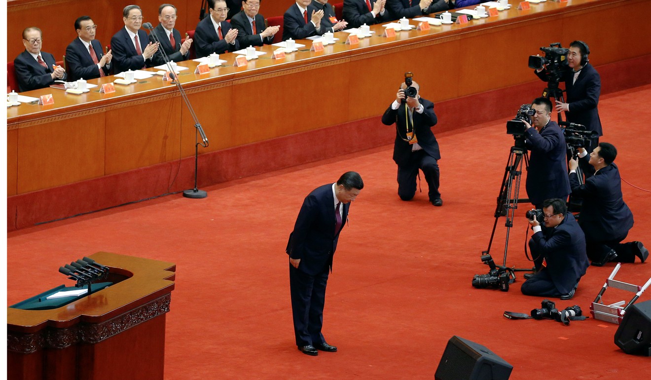 Chinese President Xi Jinping bows before delivering his speech during the opening session of the 19th congress of the Communist Party of China. Photo: Reuters
