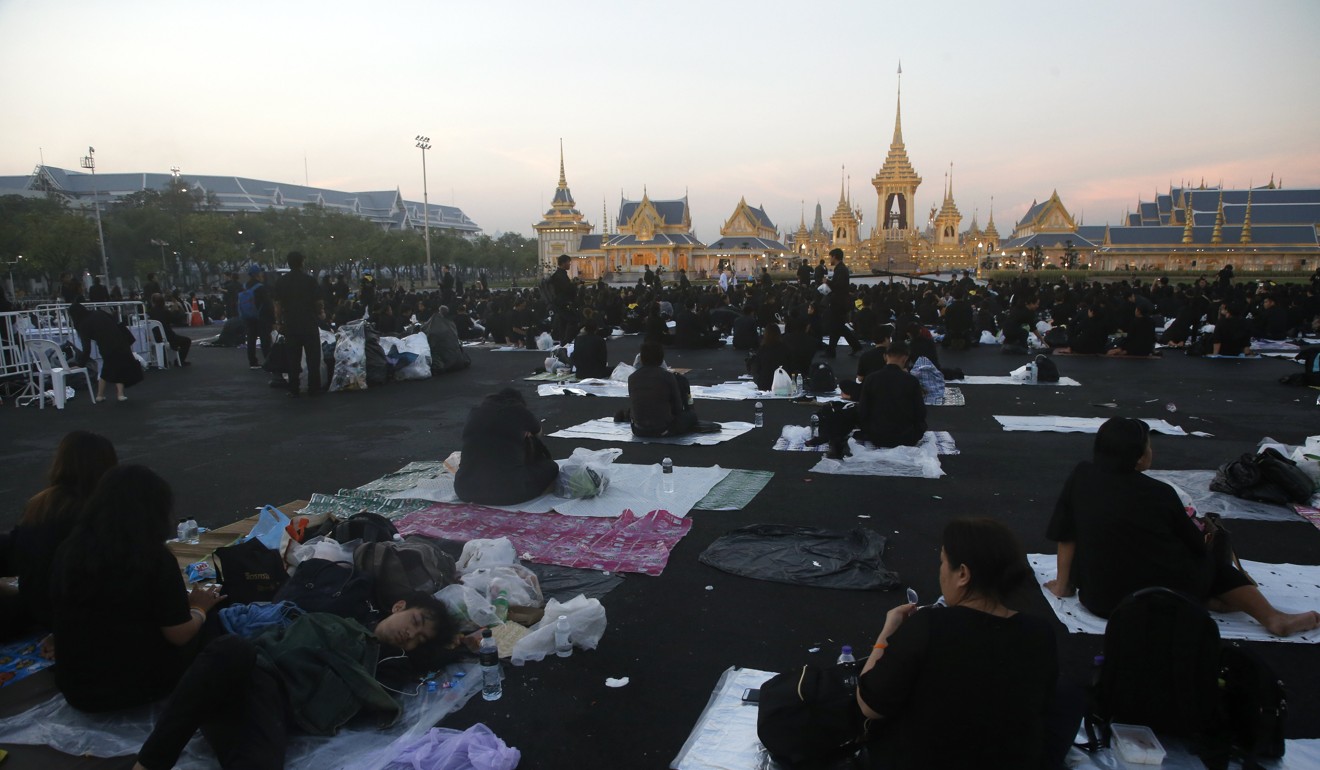 Mourners camped outside the palace in Bangkok. Photo: EPA