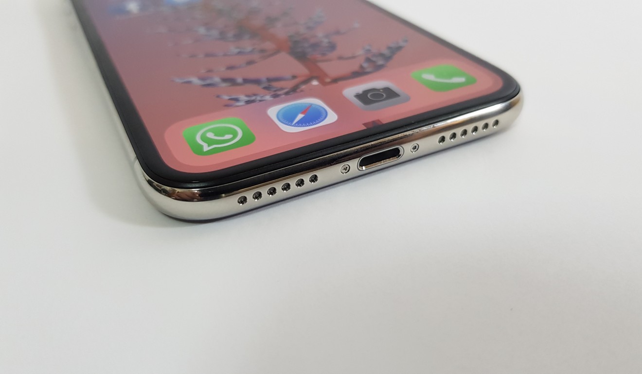 The bottom of the iPhone X houses the charging port and speaker grilles. There is no headphone jack. Photo: Ben Sin