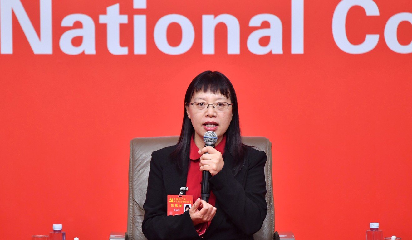 Zhang Lihua, president of the Liaoning Provincial Research Academy of Environmental Sciences, answers questions during a group interview on state efforts for a better environment during the 19th party congress in Beijing on October 23. Photo: Xinhua