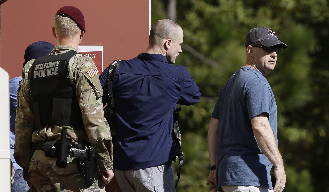 Bowe Bergdahl, centre, leaves the Fort Bragg courtroom facility following sentencing at Fort Bragg, North Carolina. He was spared prison time and received a dishonourable discharge. Photo: AP