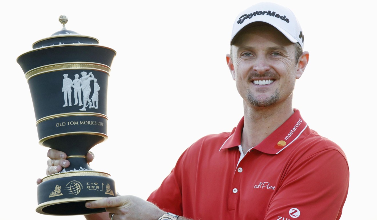 Justin Rose with the Shanghai trophy. Photo: Kyodo