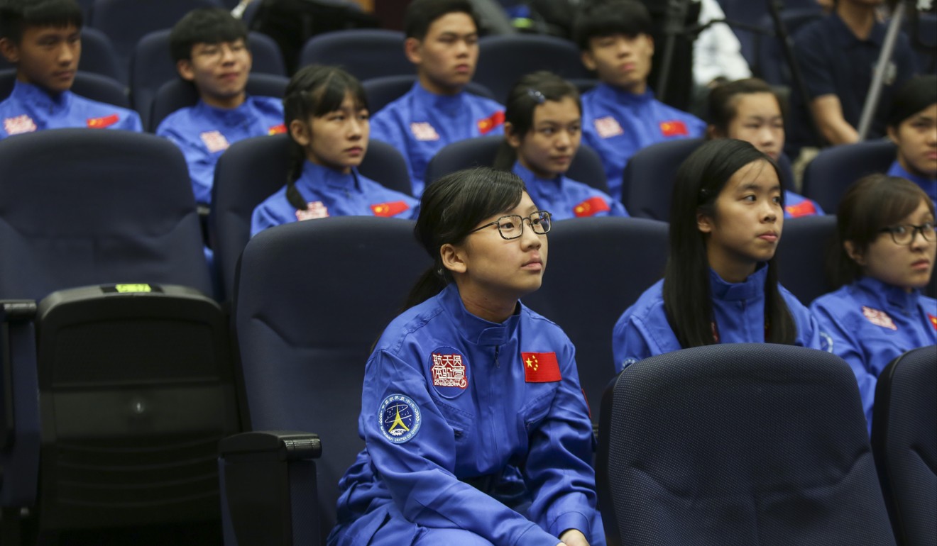 A group of secondary students gather at the Space Museum in Tsim Sha Tsui on July 25, before they are sent to Beijing for the Young Astronaut Training Camp. Photo: Xiaomei Chen