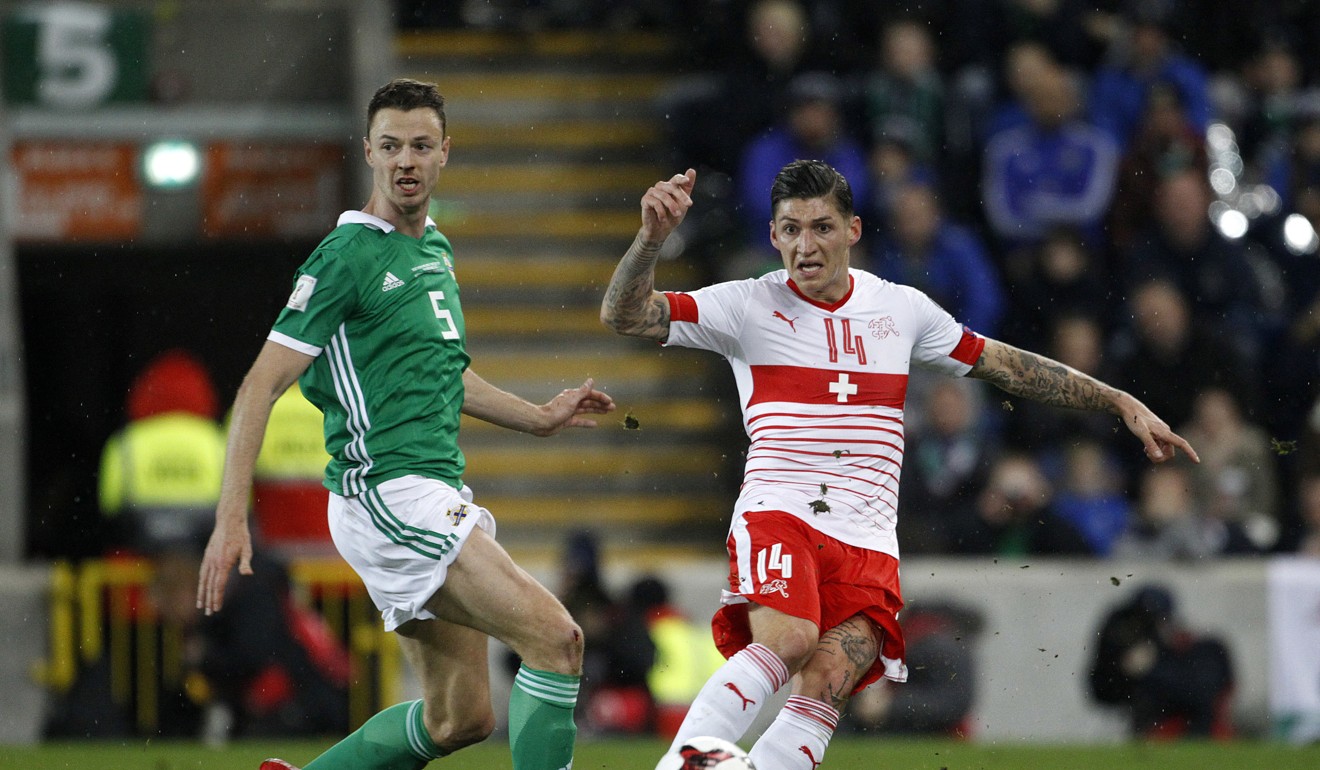 Northern Ireland's Jonny Evans (left) says he had a feeling the referee knew he made the wrong call. Photo: AP