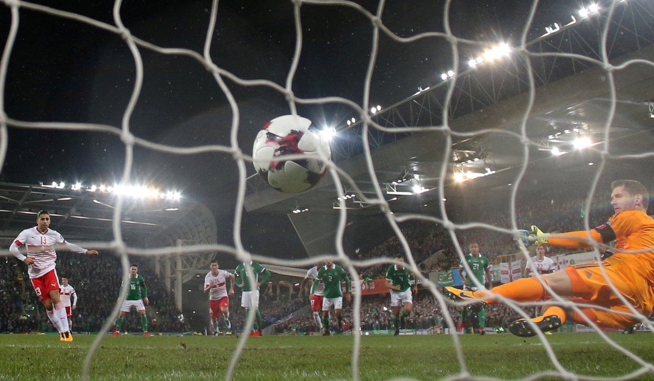 Switzerland’s Ricardo Rodriguez nails the penalty. Photo: Reuters