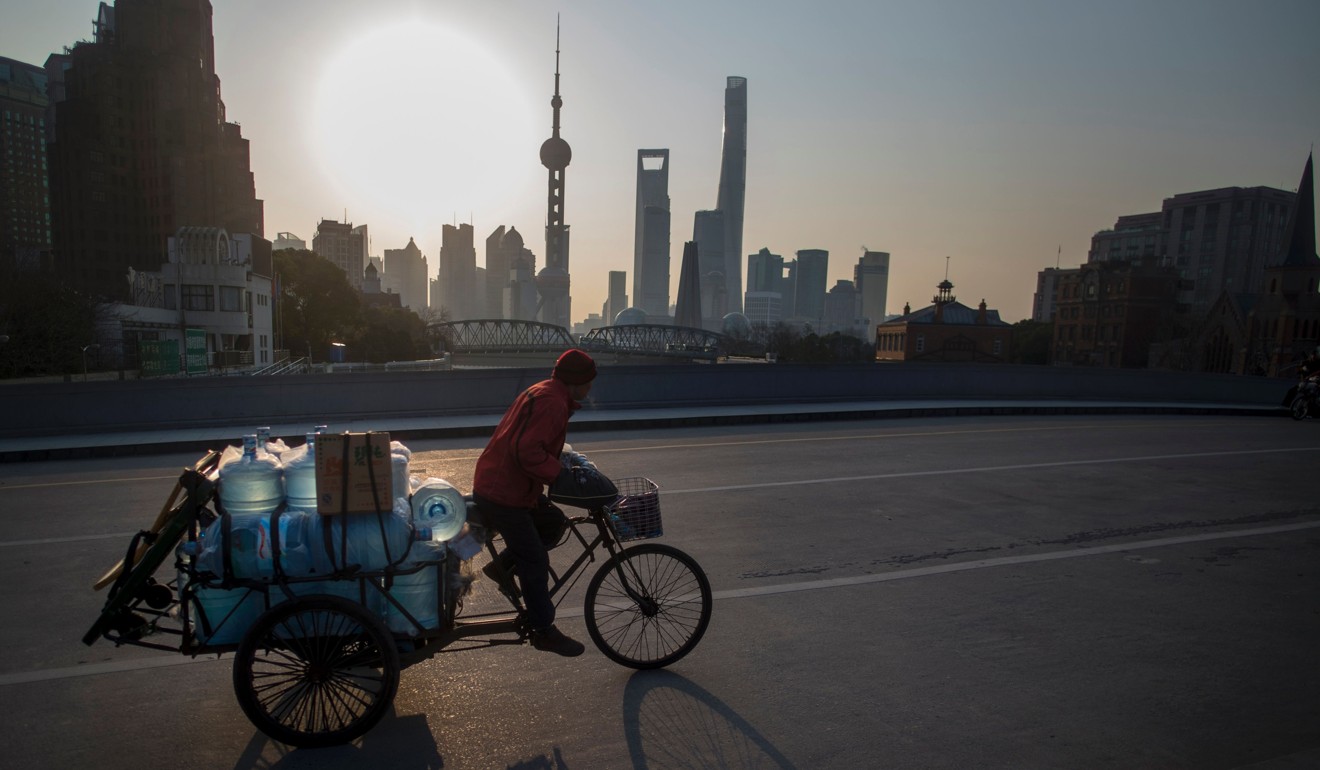China says it will open up its financial services sector to foreign players almost entirely in five years. Photo: AFP