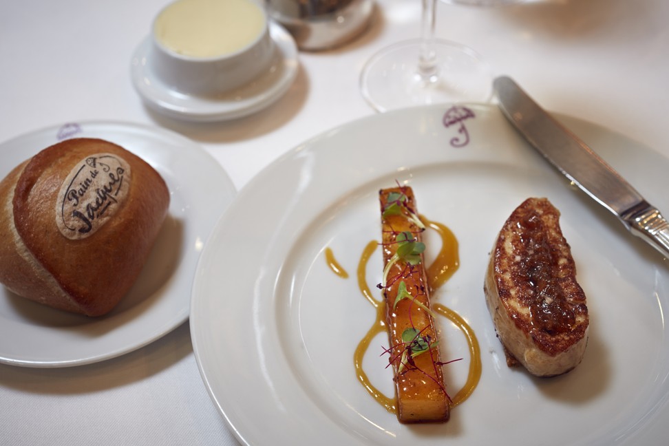 Sautéed duck foie gras escallop with lemon confit and roasted pineapple. The Marina offers fine cuisine.