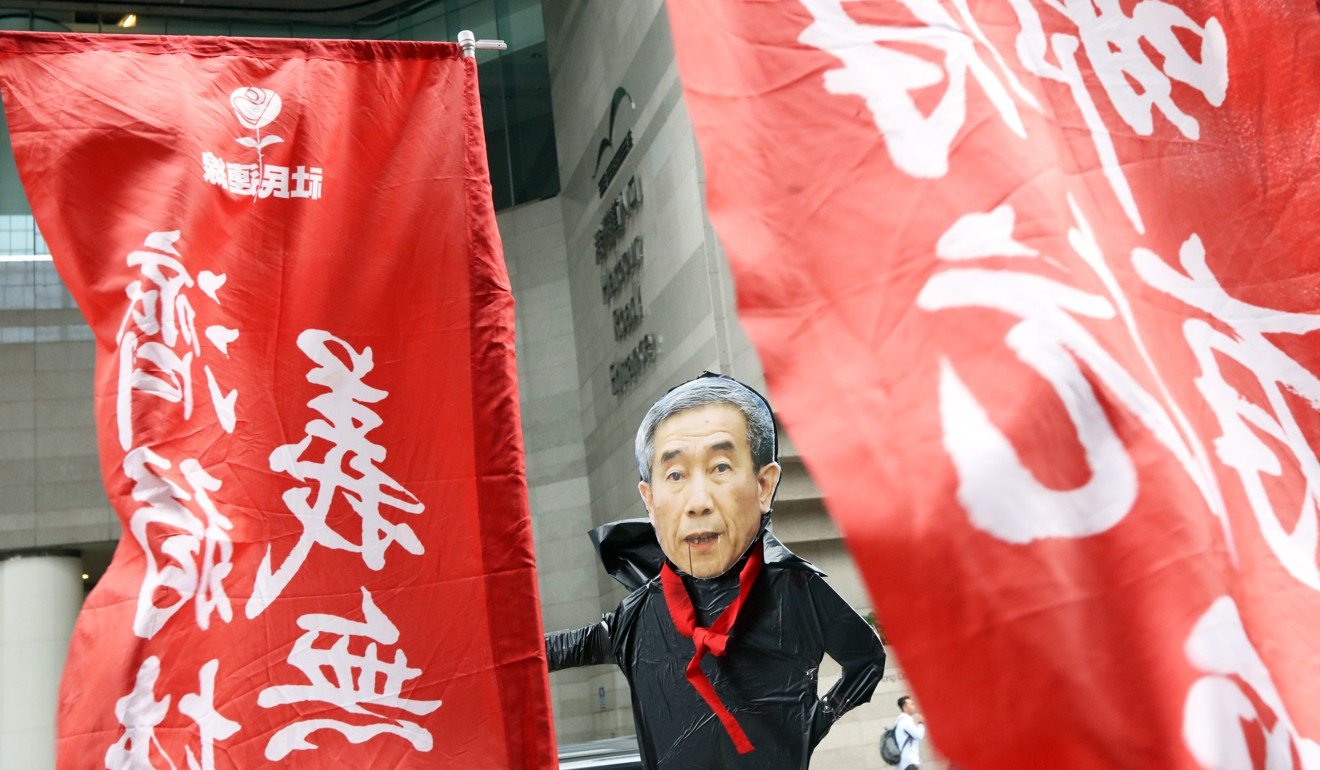 A protester wearing a Li Fei mask in Wan Chai. Photo: Felix Wong