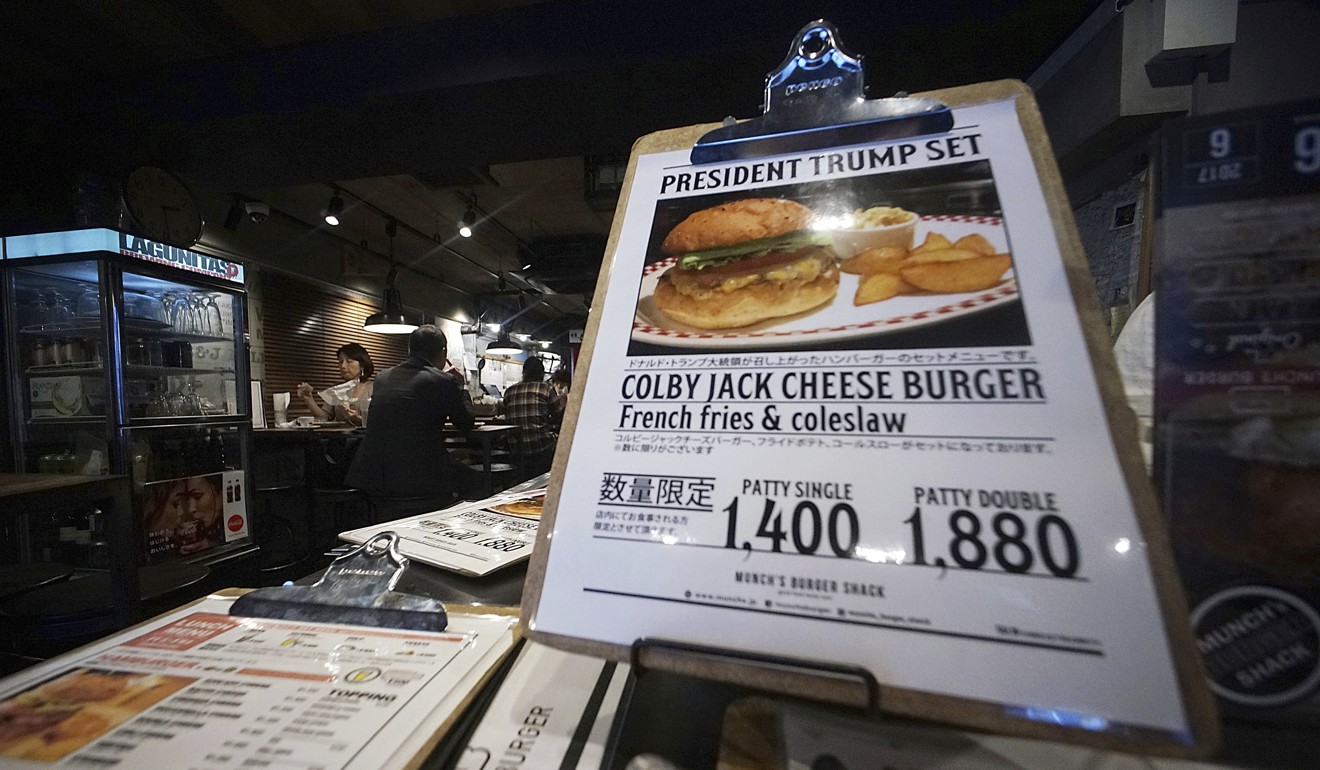 A menu showing a ‘President Trump Set’ at Munch's Burger Shack restaurant in Tokyo. Photo: AP