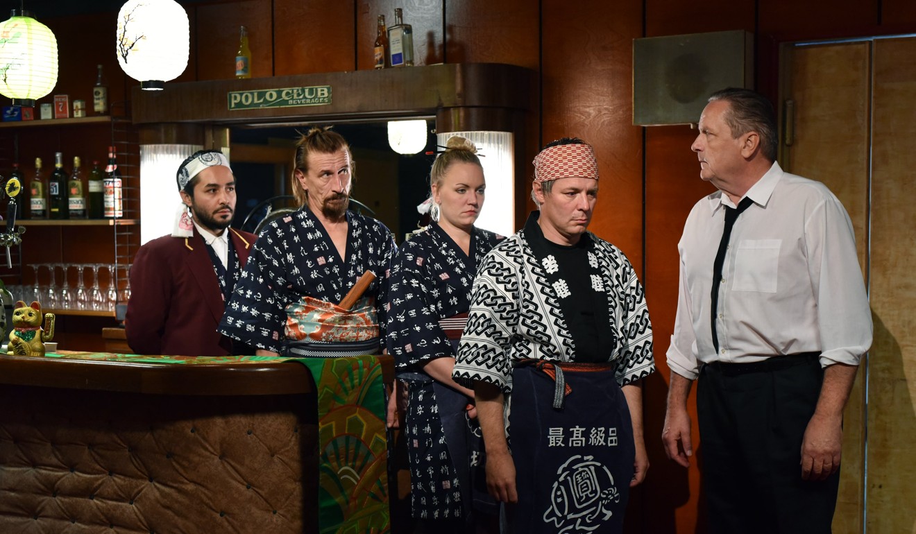 Sakari Kuosmanen (far right) plays a restaurant owner in The Other Side of Hope.