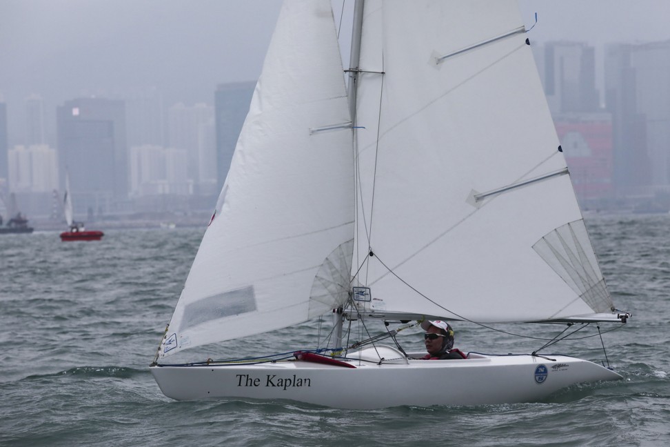 Wheelchair user Foo Yuen-wai sails in the Around the Island Race representing Sailability Hong Kong from the Royal Hong Kong Yacht Club in Causeway Bay. Photo: Jonathan Wong