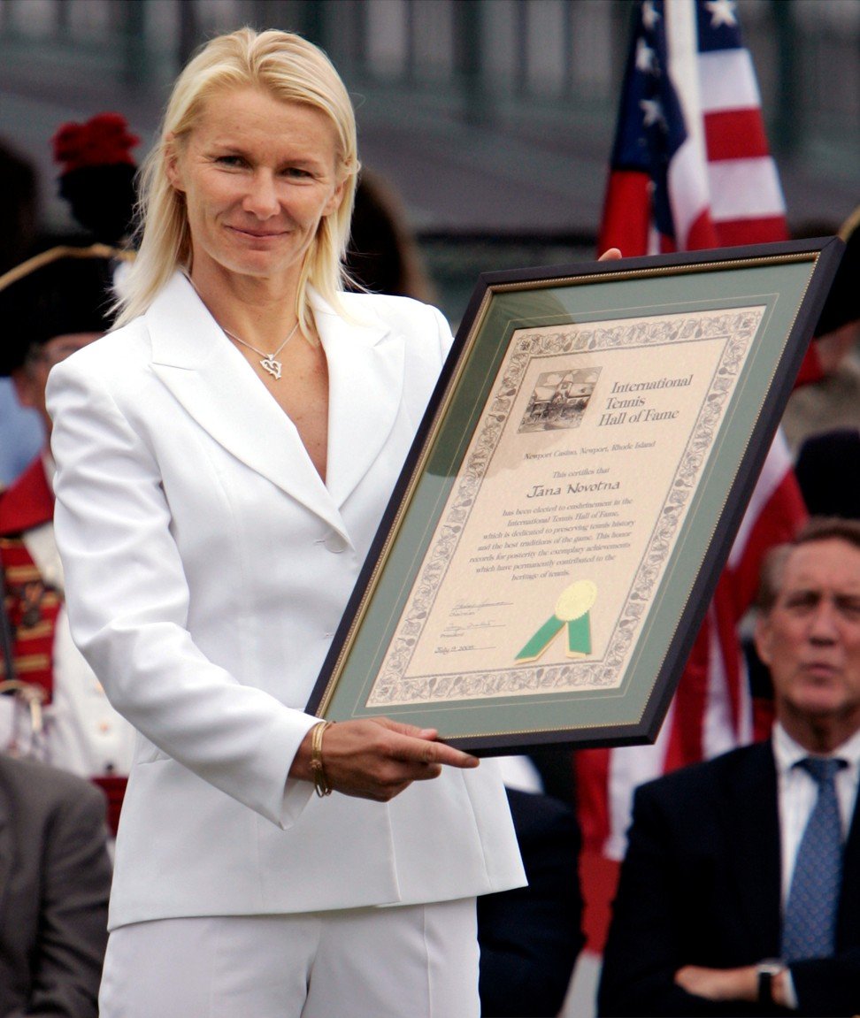 Jana Novotna holds up her certificate after being inducted into the International Tennis Hall of Fame in 2005. Photo: Reuters