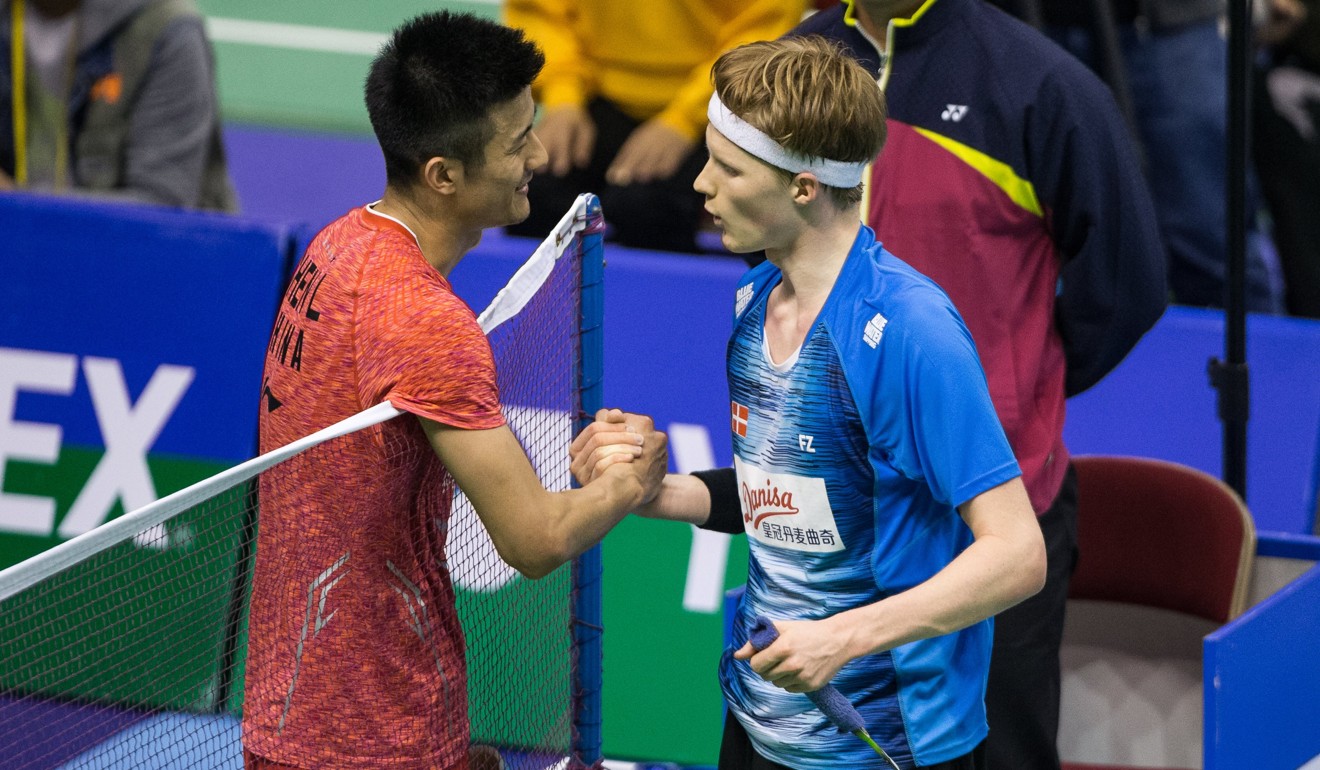 Chen Long shakes hands with Denmark’s Anders Antonsen after winning his semi-final. Photo: EPA
