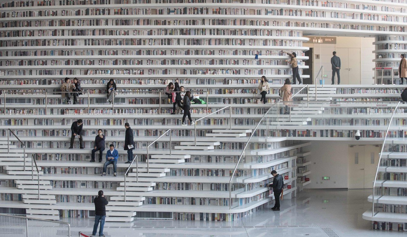 People visit the futuristic Tianjin Binhai Library this month in Tianjin. The tier-1 cities of Beijing, Shanghai, Tianjin, Chongqing and Guangzhou should have the freedom to issue bonds. Photo: AFP