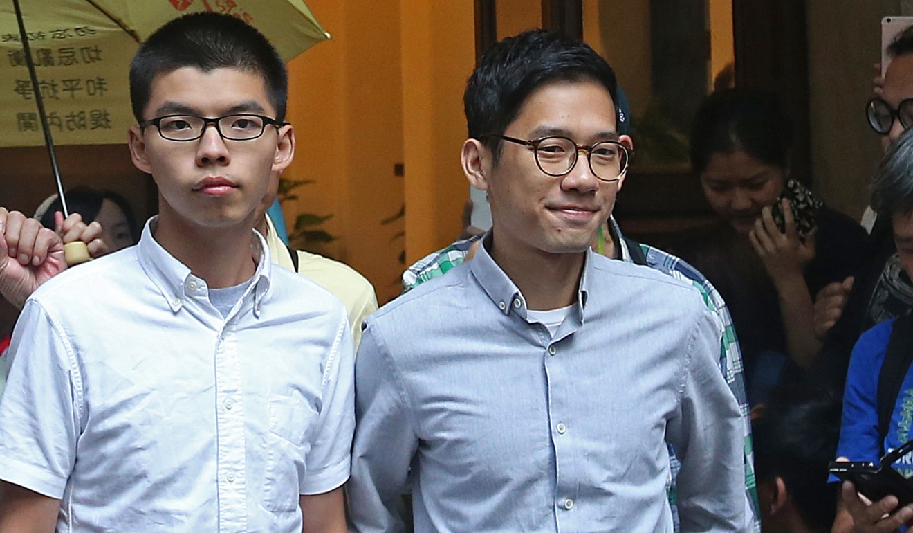 Joshua Wong (left) and Nathan Law Kwun-chung were jailed over a protest in 2014. Photo: David Wong