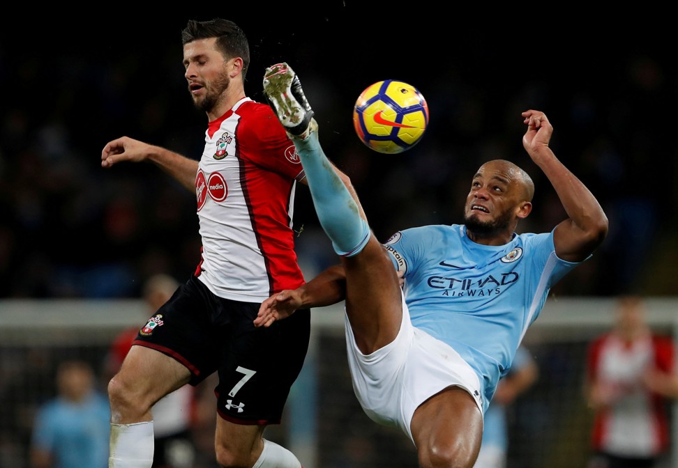 Manchester City’s Vincent Kompany in action with Southampton’s Shane Long. Photo: Reuters