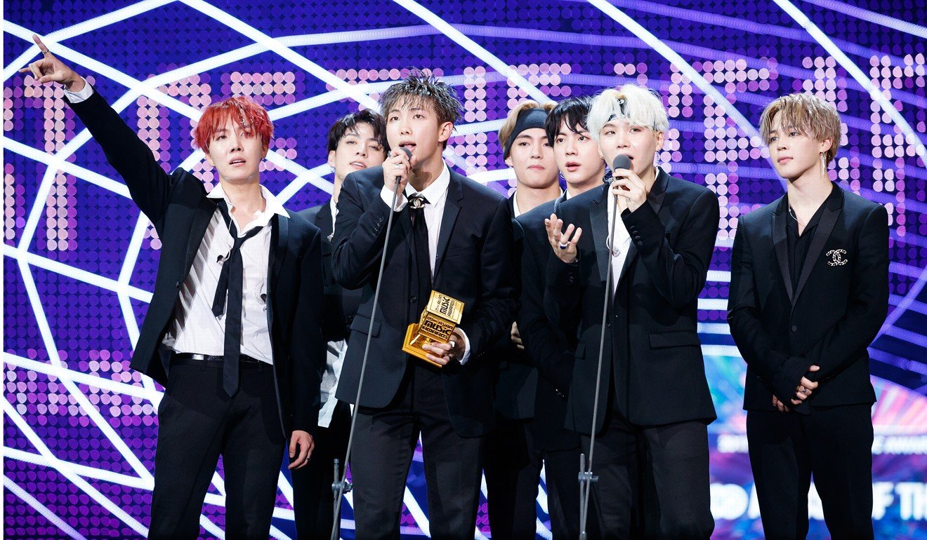 BTS accepts their Mama for artist of the year. Photo: Handout