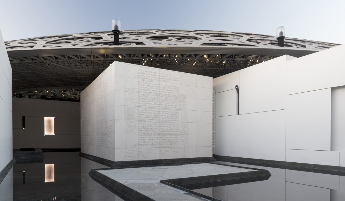 American artist Jenny Holzer’s engravings of historic texts from three different world traditions is on several of the walls of the museum. Photo: Louvre Abu Dhabi