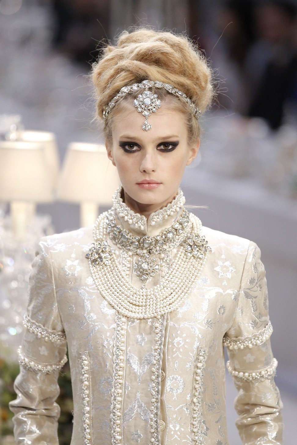 A model presents a creation with a Bombay-Paris theme by designer Karl Lagerfeld during the Metiers d'Art Show for Chanel fashion house in 2011. The show pays homage to Chanel workshops. Photo: REUTERS