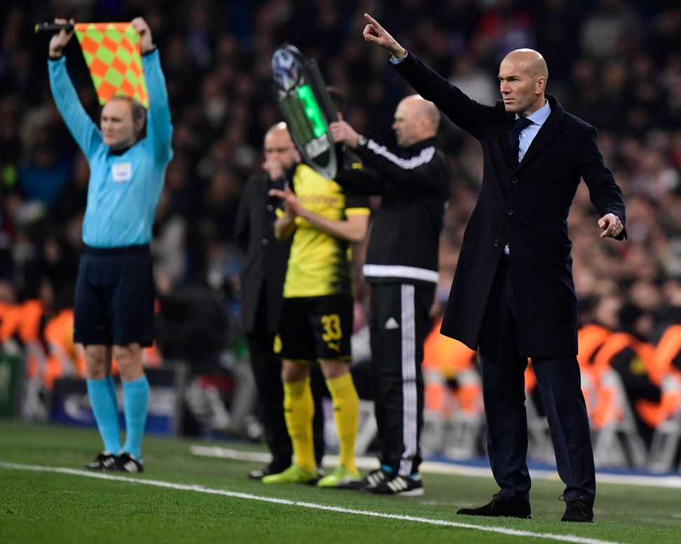 Real Madrid coach Zinedine Zidane (R) gestures during the Uefa Champions League win over Borussia Dortmund. Photo: AFP