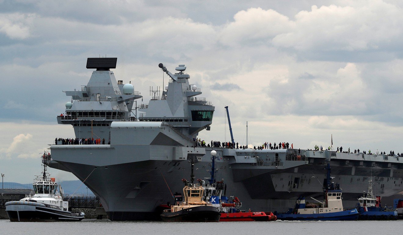 The British aircraft carrier HMS Queen Elizabeth set of on its maiden voyage in June. Photo: Reuters