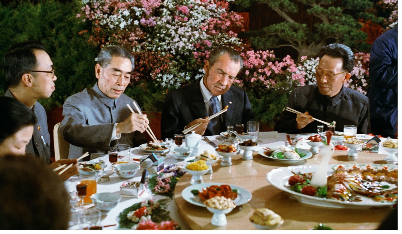 US President Richard Nixon tries using chopsticks at a banquet given in his honour by Premier Zhou Enlai (left) and Communist Party Leader Chang Chung-chiao (right) in 1972 in Beijing. Photo: Post Magazine