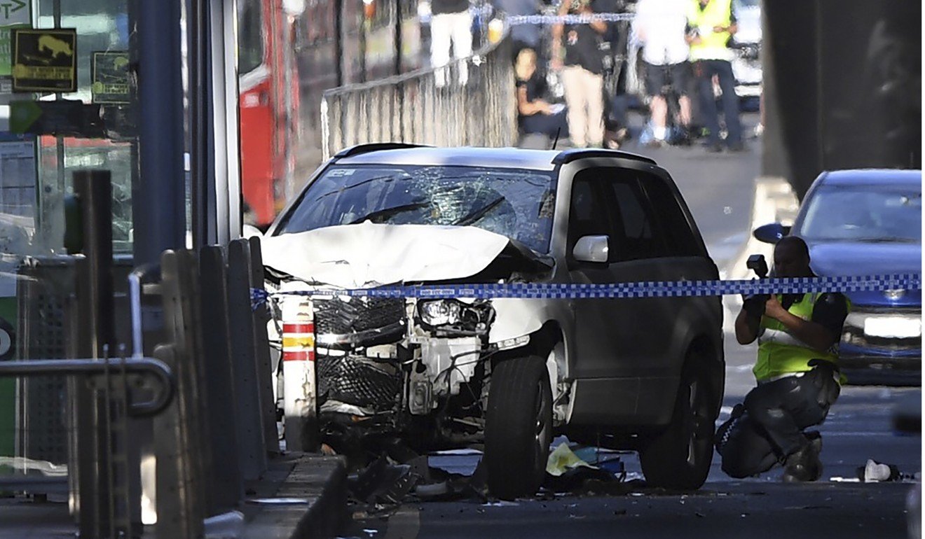 The damaged vehicle on Flinders Street. Photo: AP
