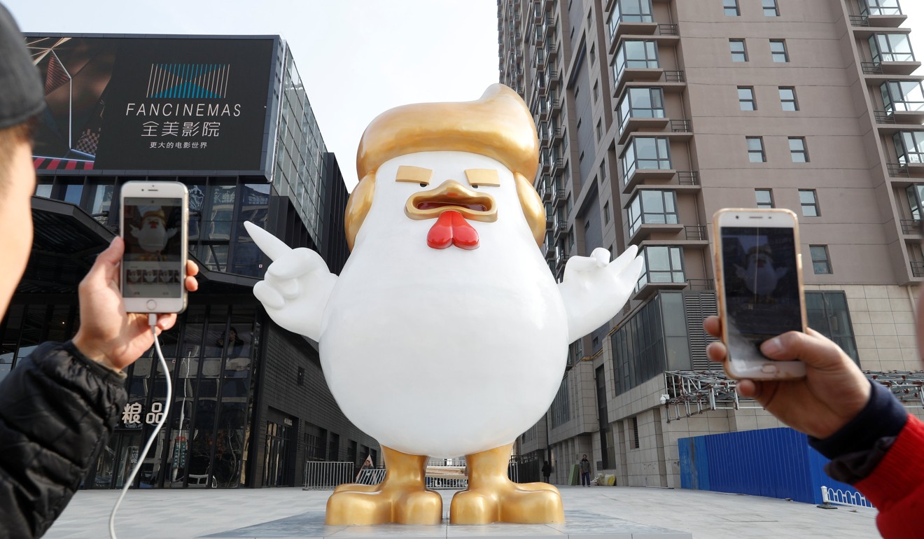 Last year the mall erected this statue of Trump as a giant chicken, to mark the incoming Year of the Rooster. Photo: REUTERS