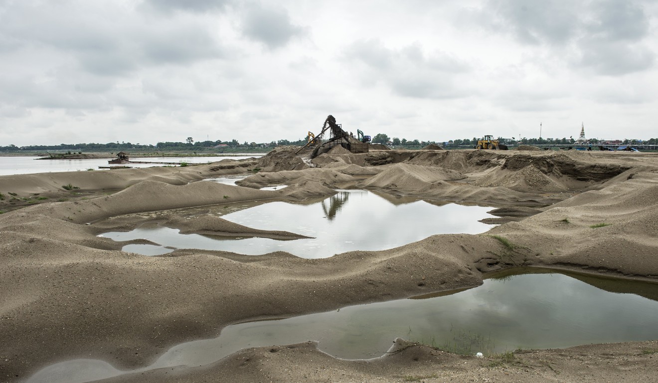 Sand extraction along the Mekong River in Vientiane, Laos. Photo: AFP