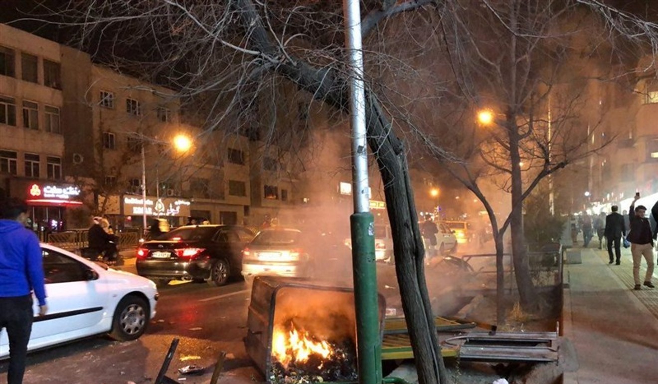 Unrest on the streets of central Tehran. Photo: Kyodo
