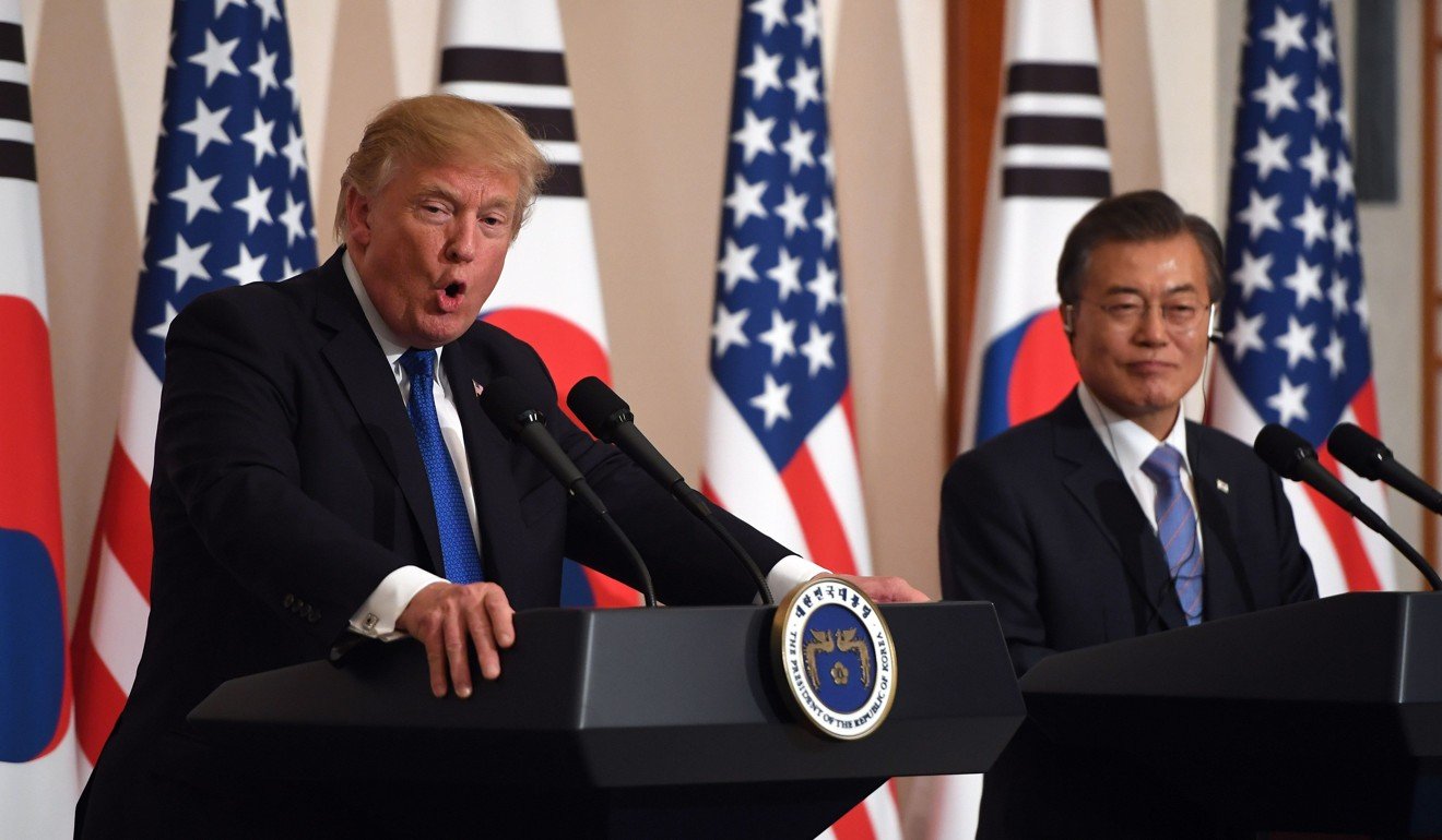 Visiting US President Donald Trump and South Korean President Moon Jae-in talk to the press, at the presidential Blue House in Seoul on November 7. Photo: AFP