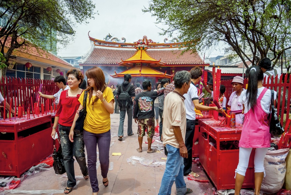 Crowds visiting the Dharma Bhakti temple to celebrate Lunar New Year in 2008. Photo: Alamy