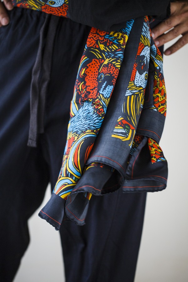 A silk sash sets off an all-black ensemble. Photo: Michelle Wong