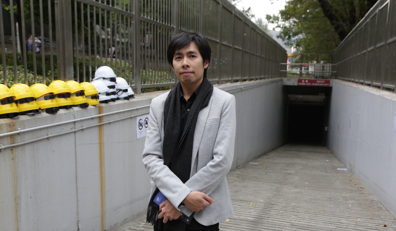 Artist Kingsley Ng in front of the entrance to the Tai Hang Tung stormwater storage tank. Photo: Jane Zhang
