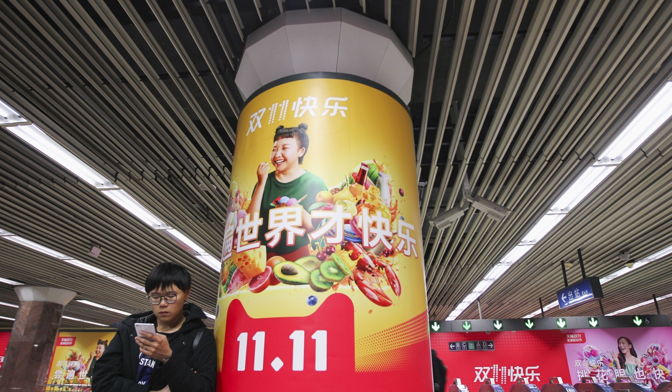 A poster about the Singles’ Day shopping festival in a subway station in Beijing on November 9, 2017. Singles’ Day, the world’s biggest e-commerce shopping festival, is powered by AI. Photo: SCMP/Simon Song