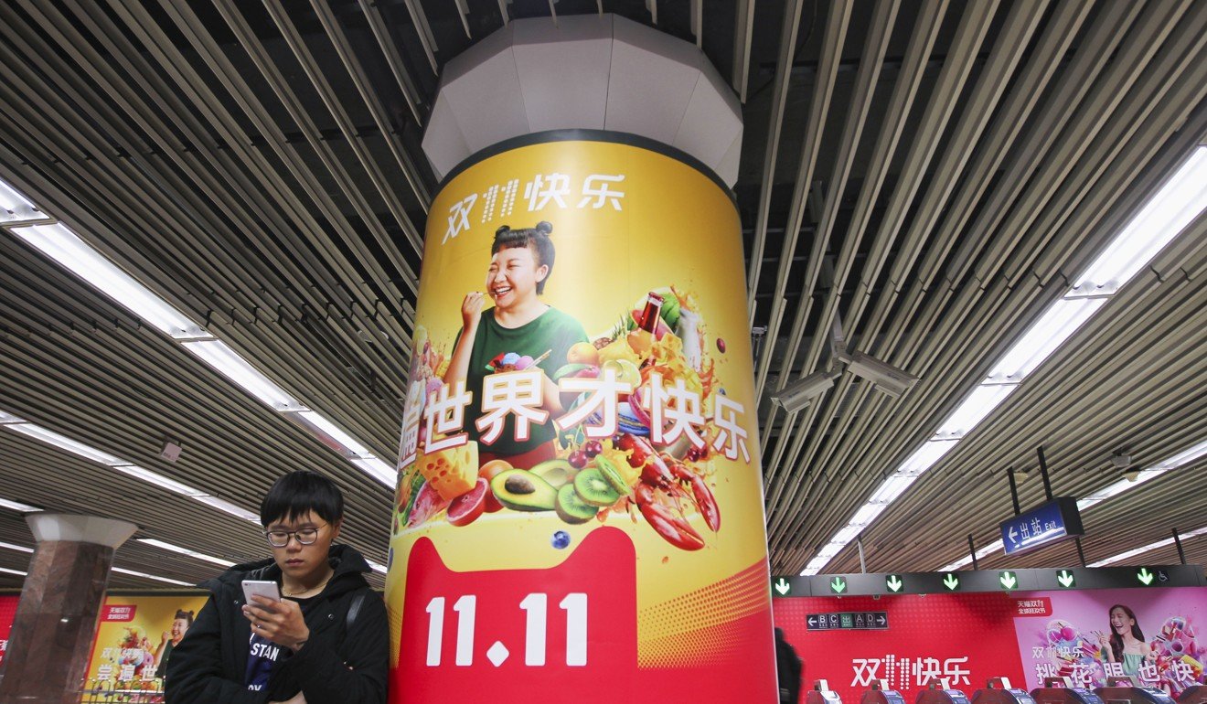 A poster about the Singles’ Day shopping festival in a subway station in Beijing on November 9, 2017. Singles’ Day, the world’s biggest e-commerce shopping festival, is powered by AI. Photo: SCMP/Simon Song