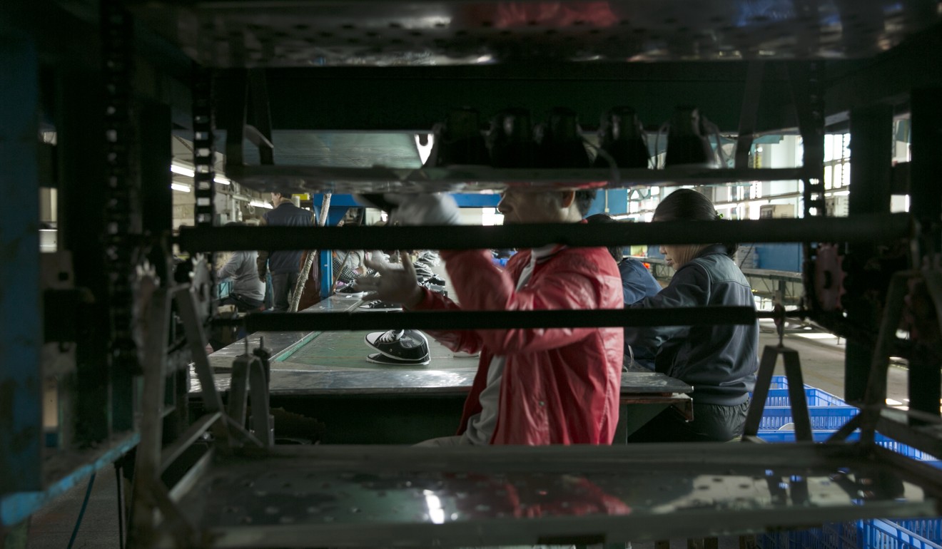 An assembly line at the Dongguan Yintong Shoes factory. Photo: Thomas Yau