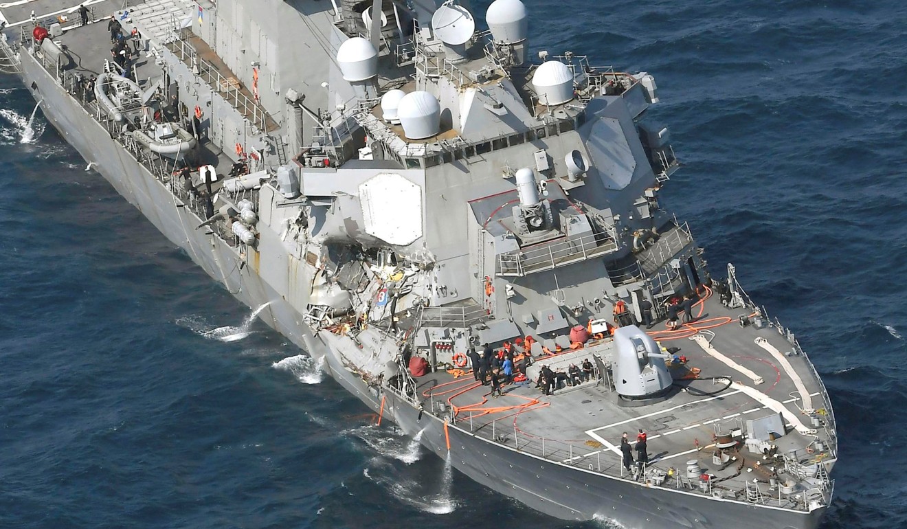 The Arleigh Burke-class guided-missile destroyer USS Fitzgerald. damaged by colliding with a Philippine-flagged merchant vessel. is seen off Shimoda, Japan in this June 17 photo. Photo: Reuters / Kyodo
