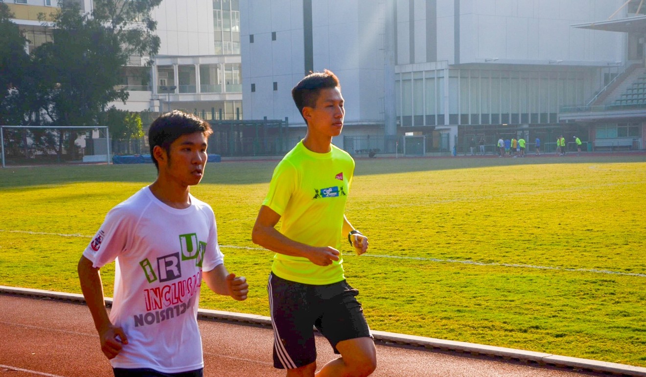 Chan and Yuen practice ahead of the Hong Kong Marathon.