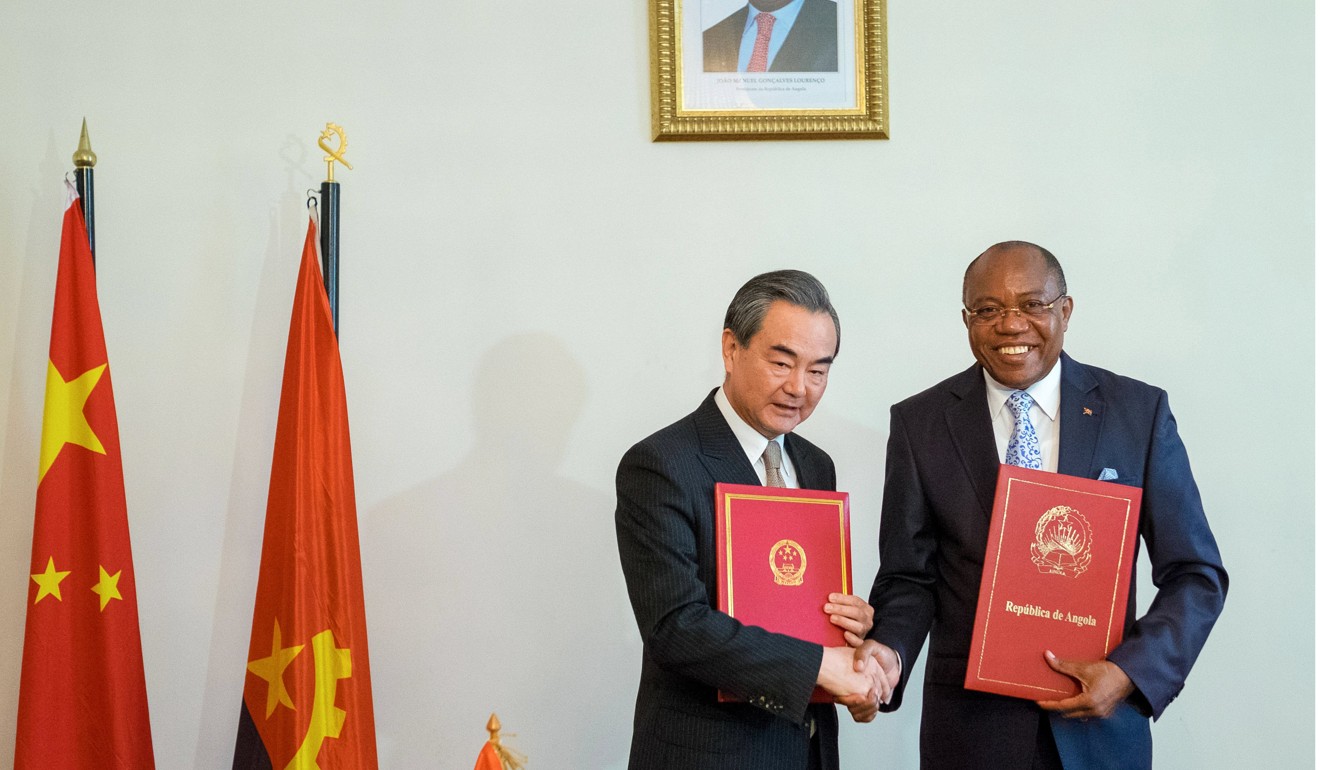 Chinese Foreign Affairs Minister Wang Yi with Angolan Foreign Minister Manuel Augusto. Photo: EPA