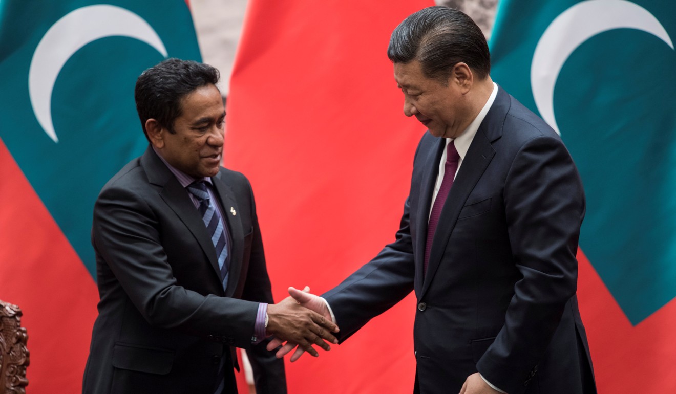 Maldives President Abdulla Yameen shakes the hand of China's President Xi Jinping after a meeting in Beijing in December. File photo: Reuters