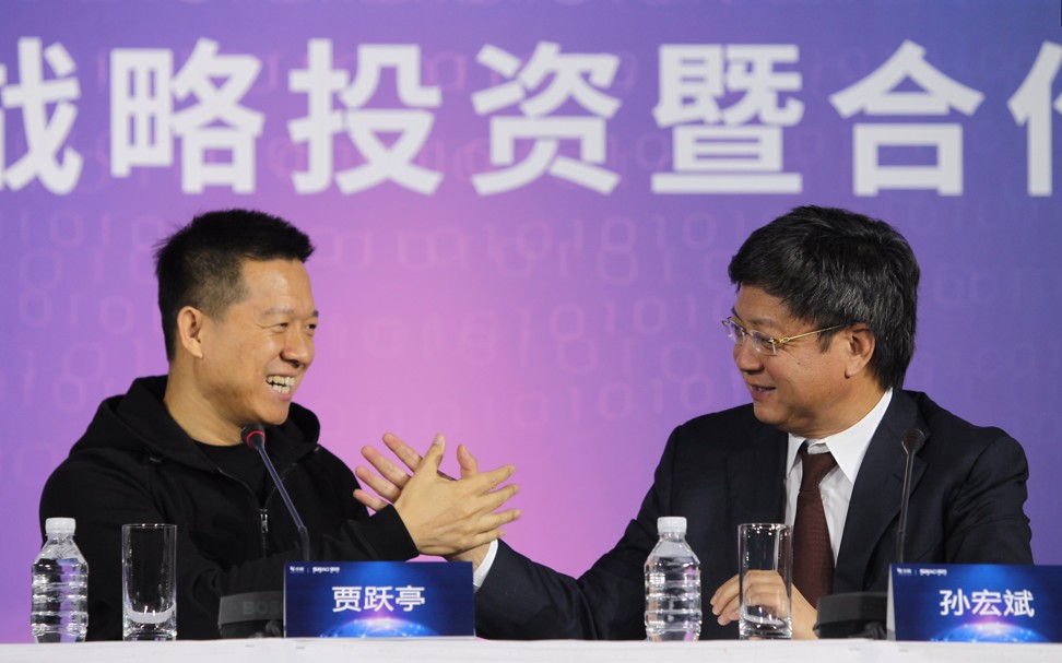 Happier times: Jia Yueting (L), founder and Chairman of LeEco, and Sun Hongbin, Chairman of Sunac China Holdings Ltd, attend a press conference regarding the strategic investment cooperation in Beijing on January 15, 2017. Photo: SCMP/Simon Song