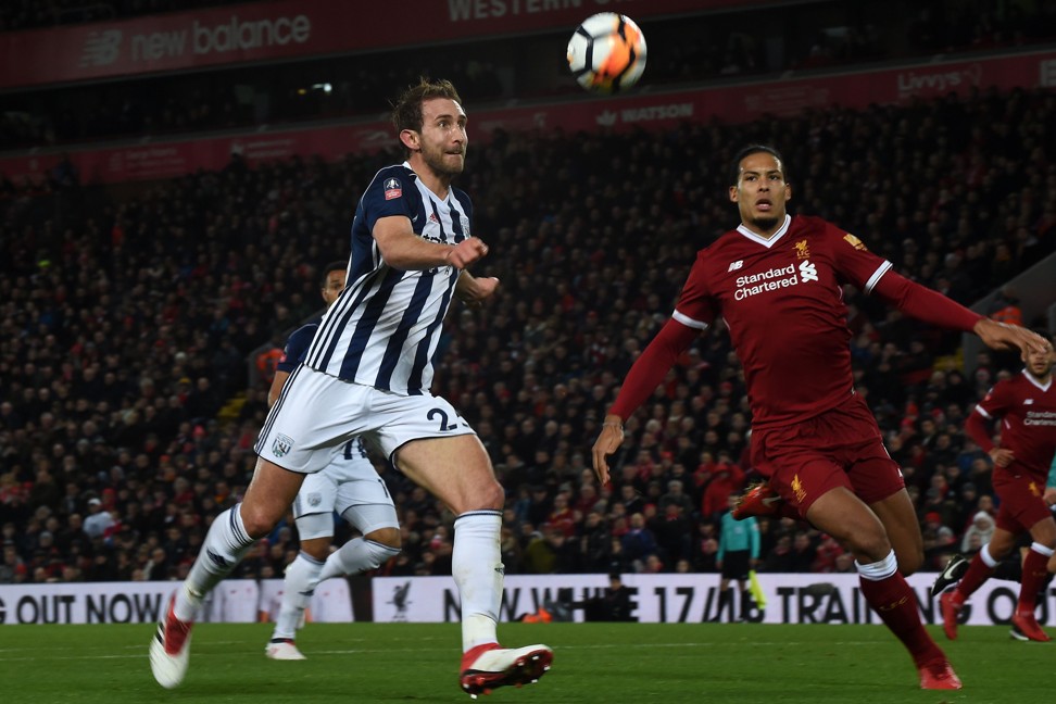 Dawson (L) prepares to cross the ball in the build up to West Brom’s third goal. Photo: AFP