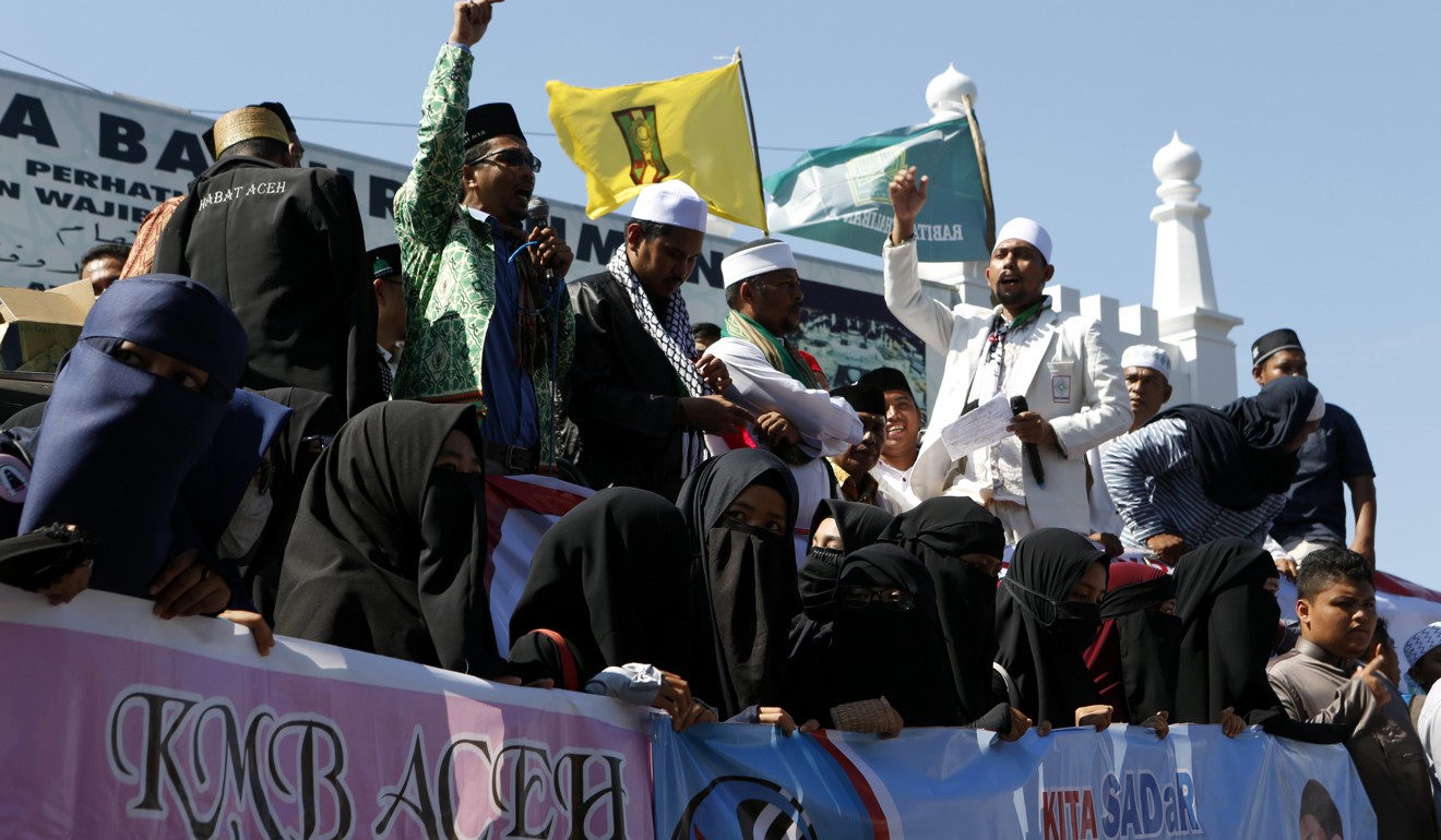 Muslim activists at an anti-LGBT rally in Banda Aceh, Indonesia on Friday. Photo: EPA