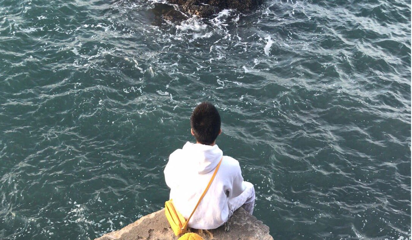 Young Takeen looks out to sea and contemplates his future.