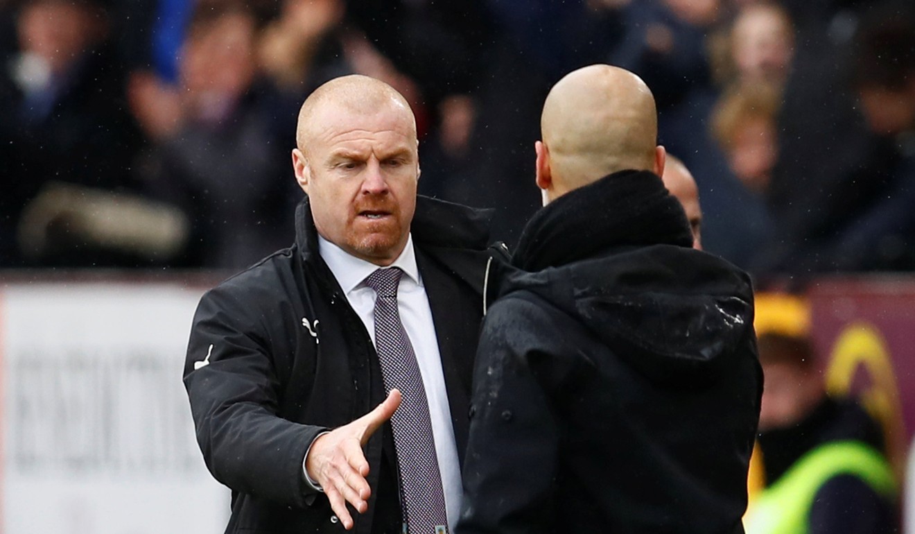 Burnley manager Sean Dyche shakes hands with Manchester City boss Pep Guardiola at the end of the match. Photo: Reuters