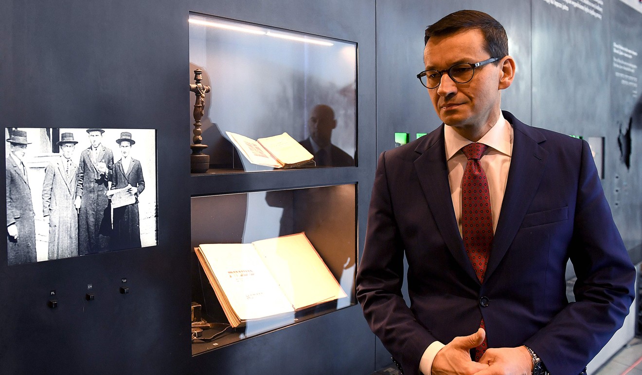 Poland’s Prime Minister Mateusz Morawiecki visits the Ulma Family Museum, which documents the fate of the Polish Ulma family, killed in March 1944 by Nazi Germans for rescuing Jews during the Holocaust. Polish parliament passed a bill designed to defend the country's image abroad by criminalising the erroneous phrase ‘Polish death camps’. Photo: AFP
